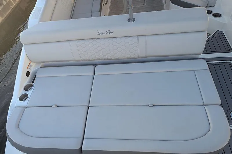 Slide: The Image of 2021 Sea Ray SDX 270 Outboard boat with spacious seating and cup holders. - 29