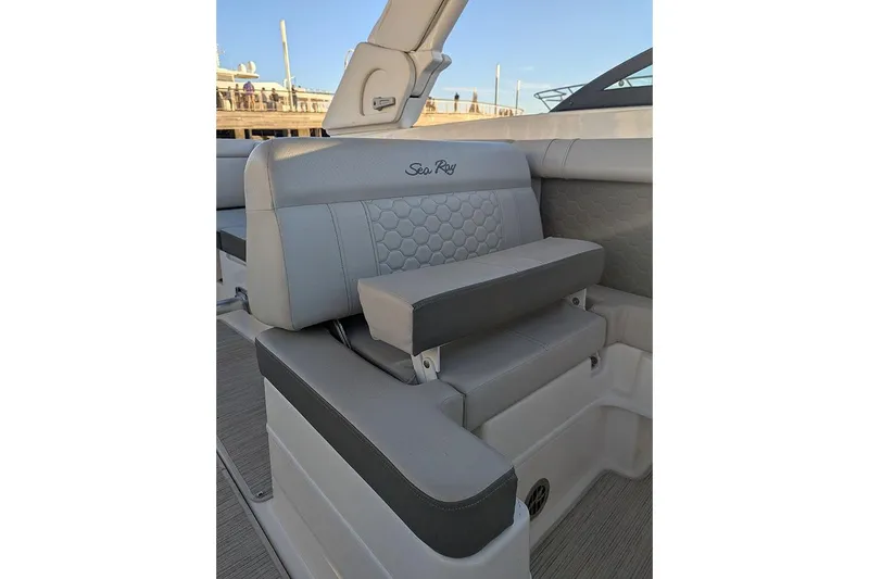 Slide: The Image of 2021 Sea Ray SDX 270 Outboard boat seat with gray upholstery and logo. - 30