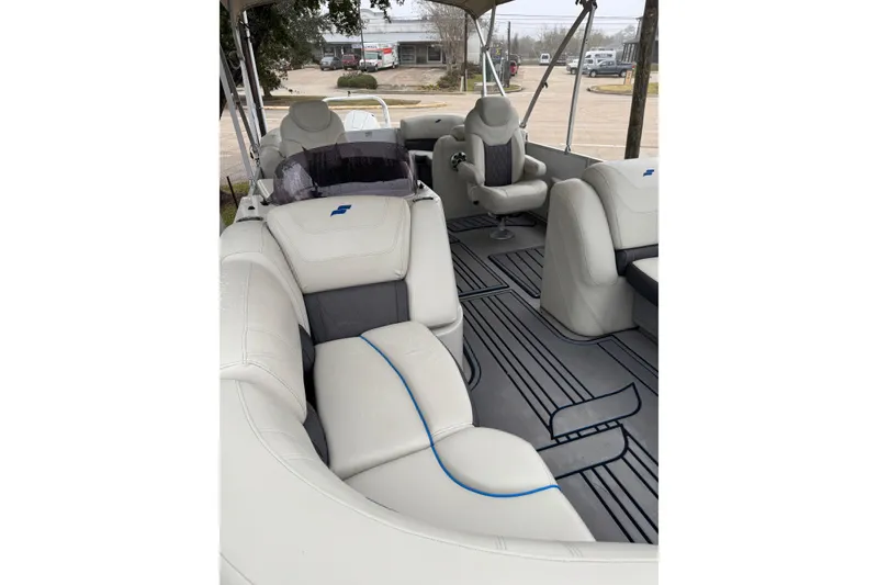 Slide: The Image of 2020 Starcraft SLS 3 boat interior with white seating and modern design. - 7