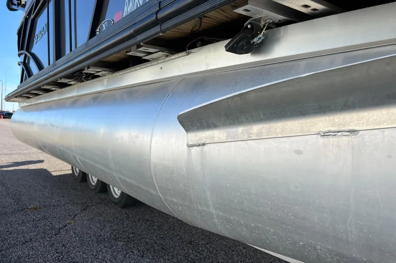 Slide: The Image of 2022 Sylvan Mirage X1 Tritoon pontoon detail, showcasing aluminum construction and design. - 15