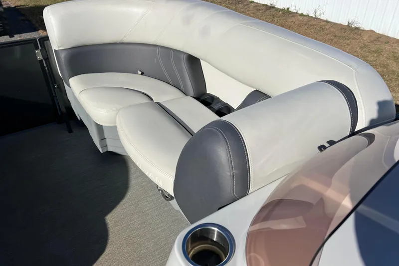 Slide: The Image of Luxurious seating on 2022 Sylvan Mirage X1 Tritoon boat, featuring sleek design and comfort. - 18