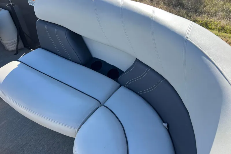 Slide: The Image of Luxurious seating on 2022 Sylvan Mirage X1 Tritoon boat, featuring sleek design and comfortable upholstery. - 20