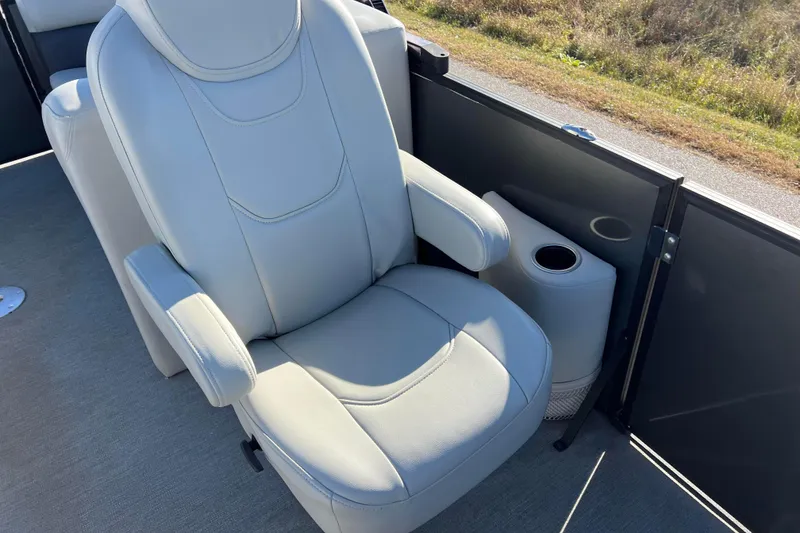 Slide: The Image of Luxurious seating on 2022 Sylvan Mirage X1 Tritoon boat with cup holder. - 23