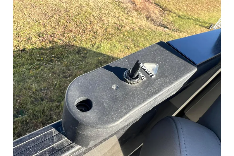 Slide: The Image of Close-up of 2022 Sylvan Mirage X1 Tritoon control panel with toggle switch. - 36