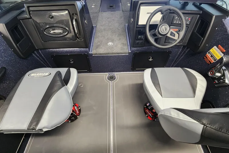 Slide: The Image of 2026 Warrior V208 boat interior with steering wheel, seats, and control panel. - 7