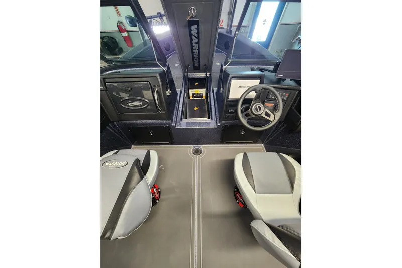 Slide: The Image of 2026 Warrior V208 boat interior with steering wheel, seats, and control panel. - 8