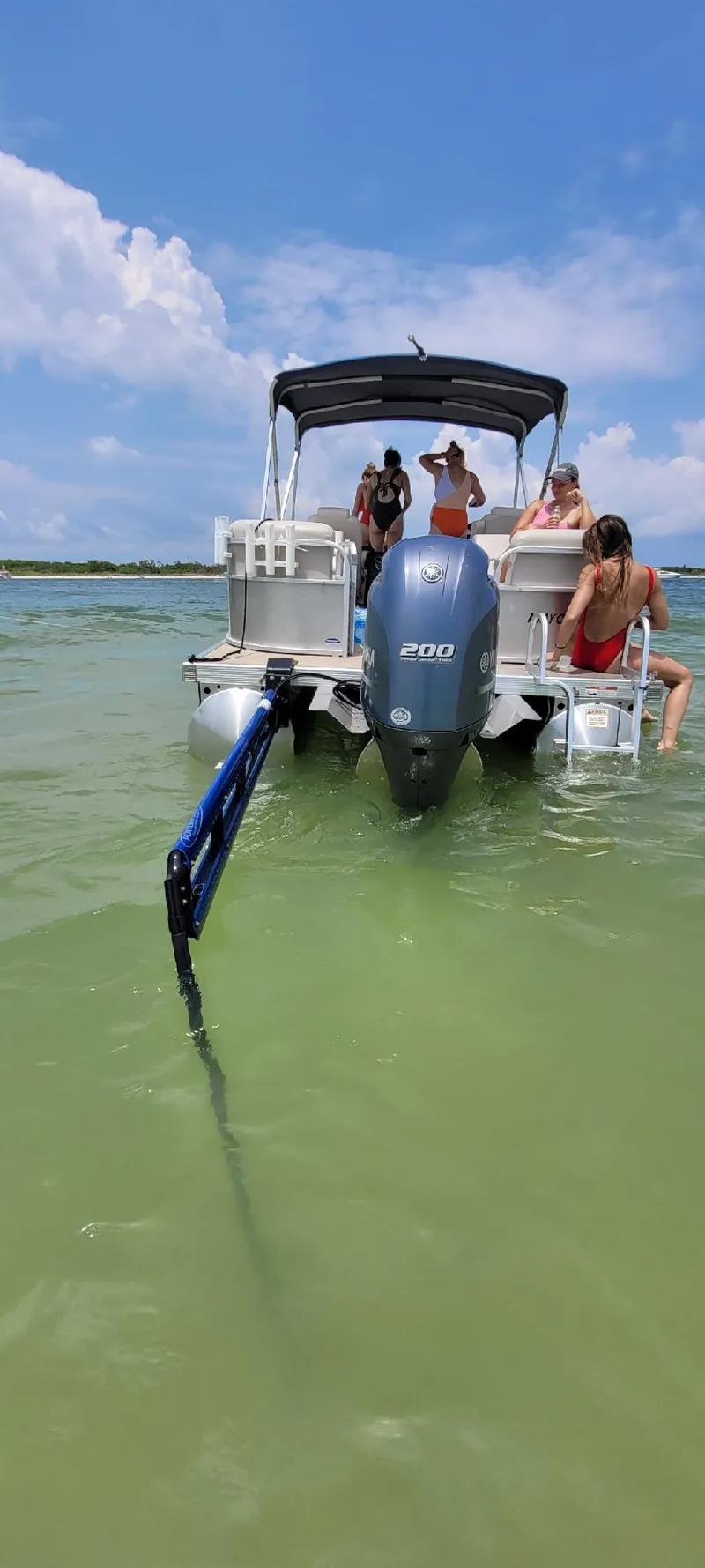 Slide: The Image of Bennington 24SSRX 2015 pontoon boat on water with passengers. - 14