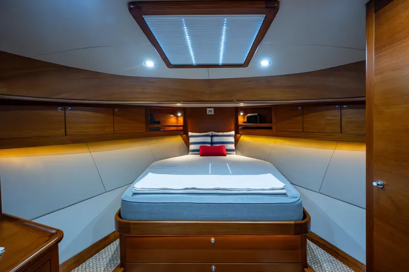 Slide: The Image of Luxurious cabin interior of 2017 Grand Banks 44 Eastbay SX yacht, featuring elegant wood finishes. - 37