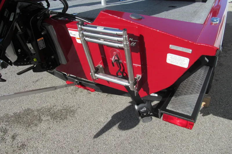 Slide: The Image of Red 2020 Tracker Pro Team 190 TX Tournament Edition boat with ladder and motor. - 12