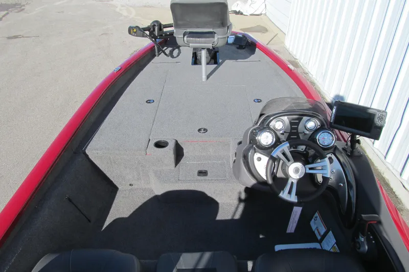 Slide: The Image of 2020 Tracker Pro Team 190 TX Tournament Edition boat interior with steering console. - 4