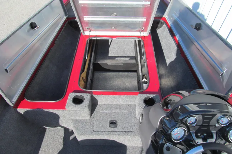 Slide: The Image of 2020 Tracker Pro Team 190 TX Tournament Edition boat interior with open storage compartments. - 7