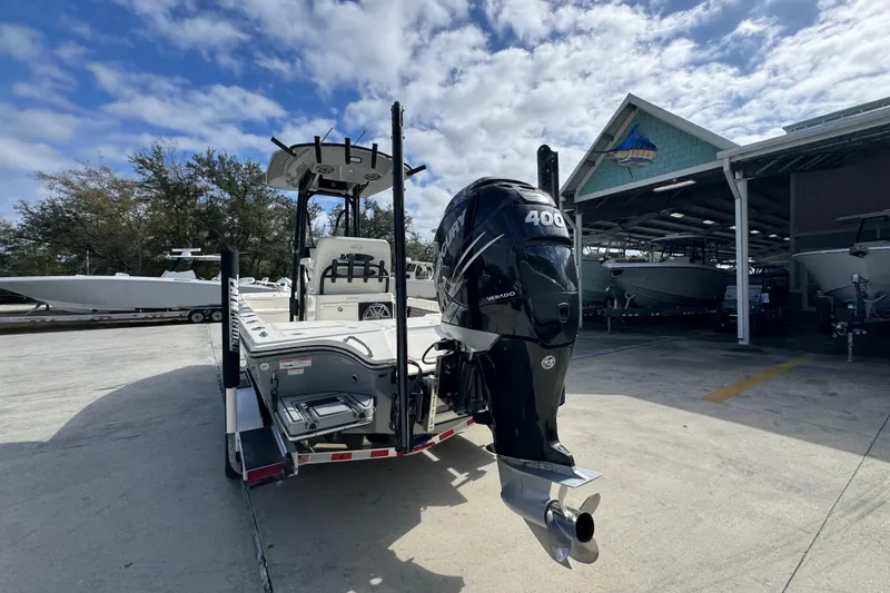 Slide: The Image of 2023 Pathfinder 2500 Hybrid boat with Mercury 400 engine at a marina. - 14