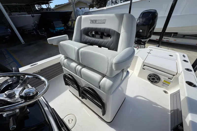 Slide: The Image of Captain's chair on 2023 Pathfinder 2500 Hybrid boat, featuring sleek design and comfortable seating. - 27