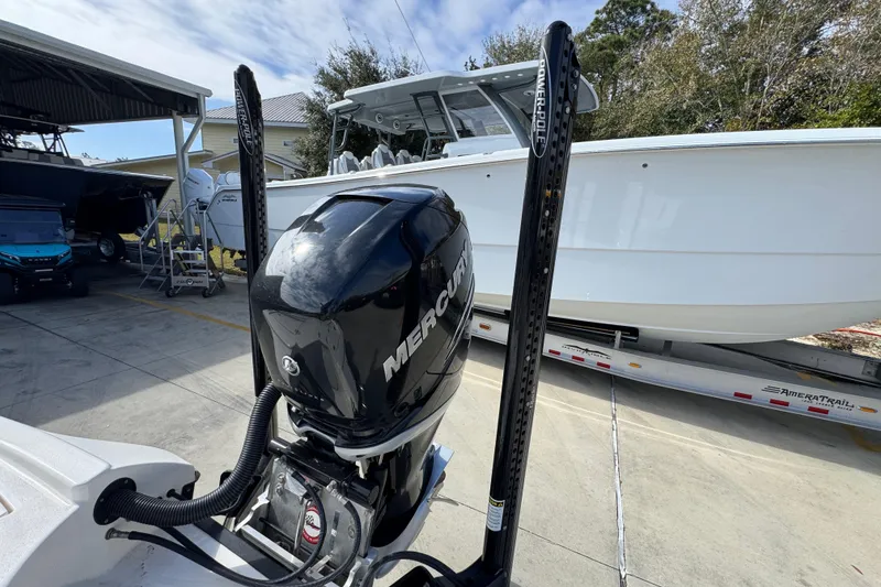 Slide: The Image of 2023 Pathfinder 2500 Hybrid boat with Mercury engine on trailer. - 40
