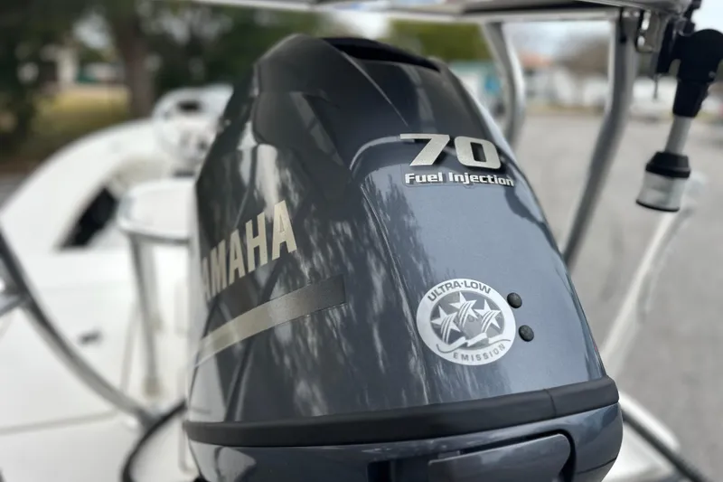 Slide: The Image of Yamaha 70 HP outboard engine on 2014 Maverick 17 HPX-V boat, featuring fuel injection. - 4