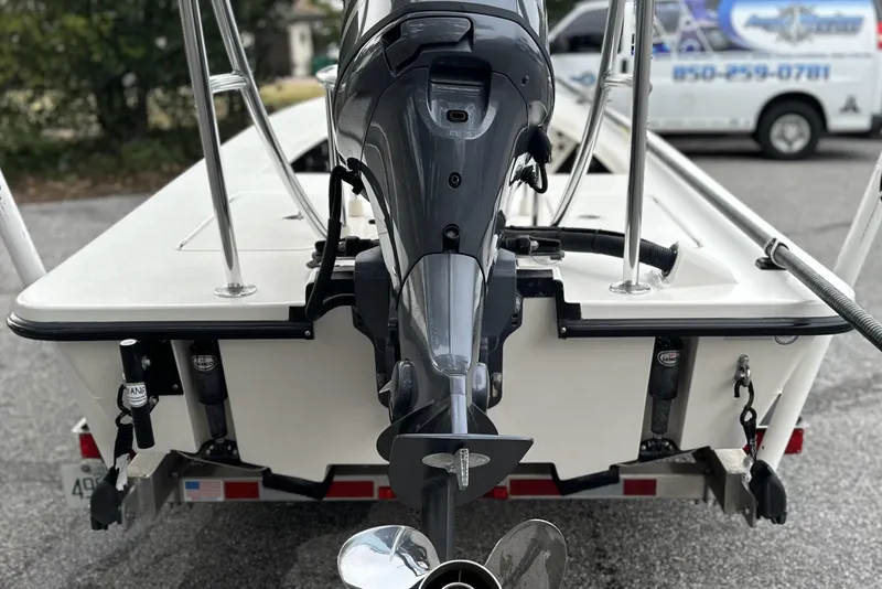 Slide: The Image of 2014 Maverick 17 HPX-V boat with outboard motor, rear view. - 5