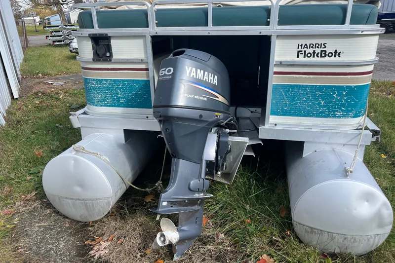 Slide: The Image of 1989 Harris FloteBote 240 Classic pontoon boat with Yamaha outboard motor. - 8