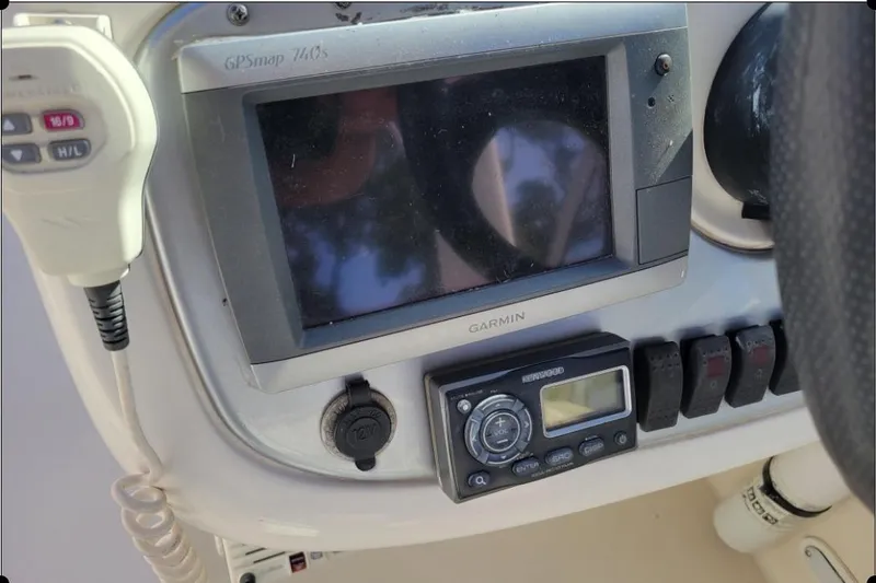 Slide: The Image of Dashboard of a 2004 Monterey 298SS Super Sport with Garmin GPS and Kenwood audio controls. - 20