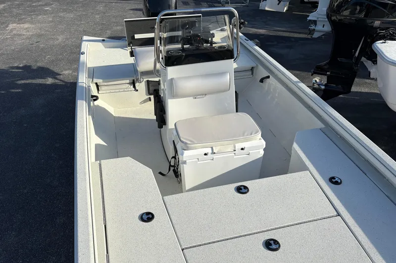 Slide: The Image of 2026 Ranger RB200 boat interior with steering console and cushioned seat. - 19