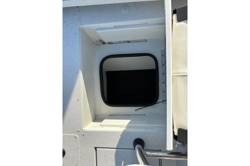 Slide: The Image of Hatch opening on 2026 Ranger RB200 boat deck, showing interior compartment. - 6