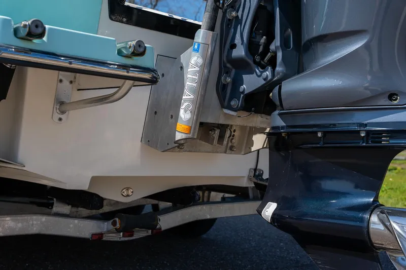 Slide: The Image of Close-up of 2018 Pathfinder 2400 TRS boat motor and Atlas hydraulic jack plate. - 54