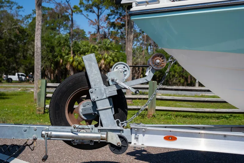 Slide: The Image of 2018 Pathfinder 2400 TRS boat on trailer, close-up of winch and wheel. - 55