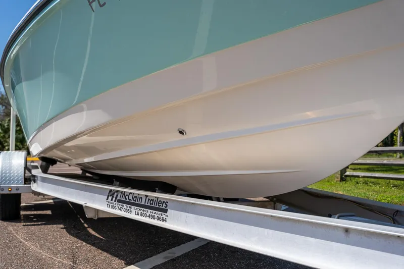 Slide: The Image of 2018 Pathfinder 2400 TRS boat on McClain trailer, close-up view. - 56