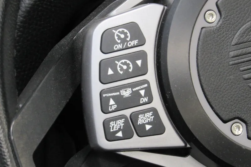 Slide: The Image of Close-up of 2021 Malibu Wakesetter 24 MXZ steering wheel controls. - 11