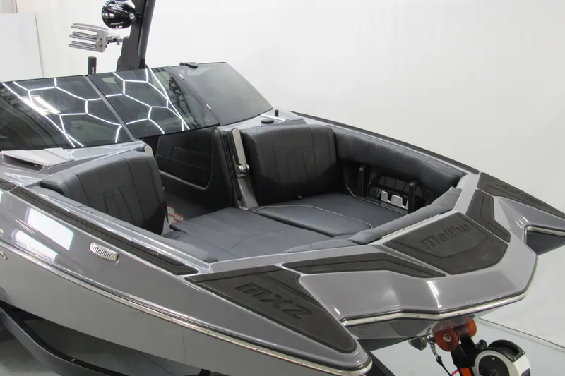 Slide: The Image of 2021 Malibu Wakesetter 24 MXZ boat interior with sleek seating and modern design. - 3