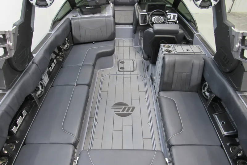 Slide: The Image of Interior of 2021 Malibu Wakesetter 24 MXZ boat with spacious seating and modern design. - 5