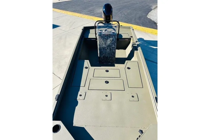 Slide: The Image of 2026 Thor 1900 boat interior with steering console and storage compartments. - 1