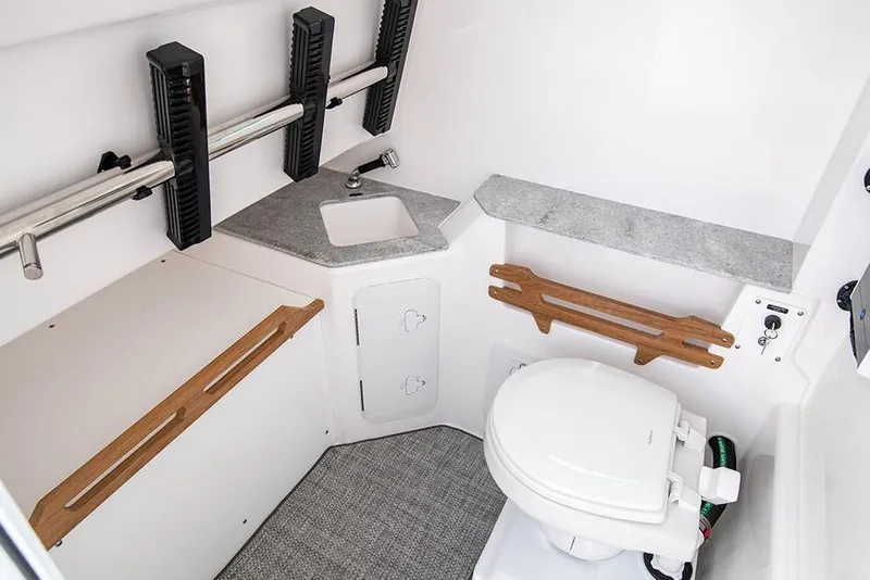 Slide: The Image of : 2021 Everglades 295 Center Console boat interior with toilet and sink. - 34