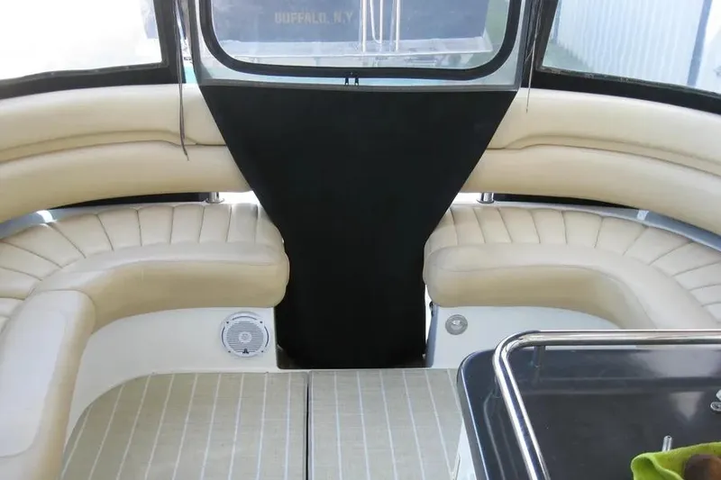 Slide: The Image of Luxurious interior of 2008 Doral Alegria boat with elegant seating and wooden table. - 25