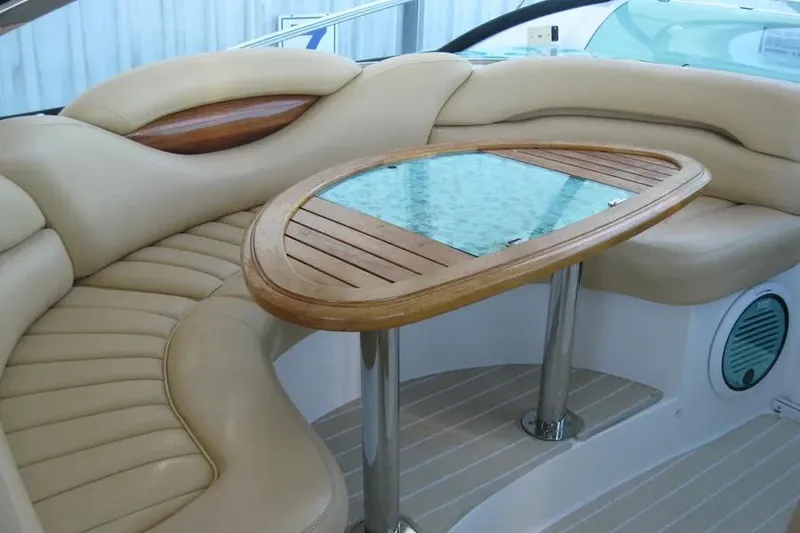 Slide: The Image of Interior view of 2008 Doral Alegria boat dashboard with cup holders and controls. - 27