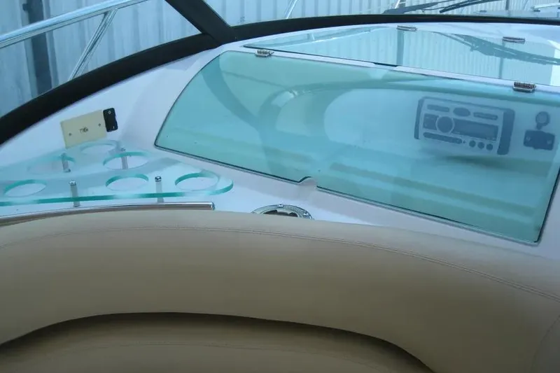 Slide: The Image of 2008 Doral Alegria boat dashboard with GPS, radar, and steering wheel. - 29