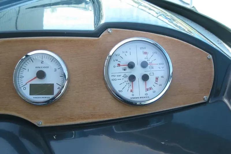 Slide: The Image of 2008 Doral Alegria boat interior with elegant beige seating and wooden table. - 40