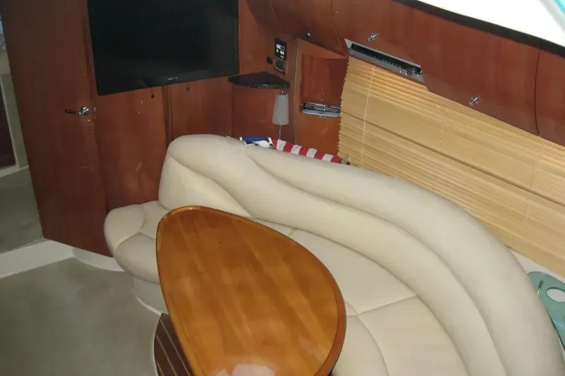 Slide: The Image of 2008 Doral Alegria yacht kitchen with granite countertops, microwave, fridge, and sink. - 44