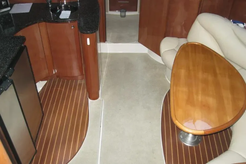 Slide: The Image of Interior of 2008 Doral Alegria yacht with stainless steel fridge and wooden cabinetry. - 45