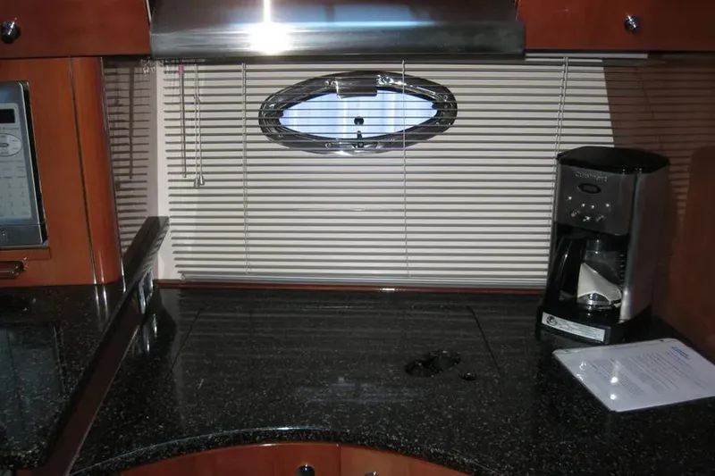Slide: The Image of 2008 Doral Alegria yacht interior with granite countertop and stainless steel sink. - 52