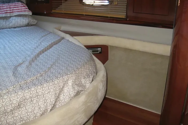 Slide: The Image of Interior of 2008 Doral Alegria yacht with wood paneling and mounted TV. - 65