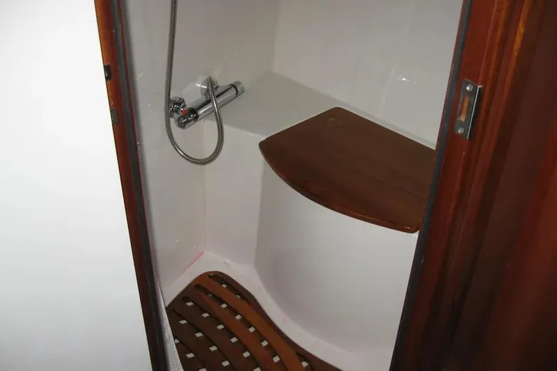 Slide: The Image of Cozy bed with striped pillows in 2008 Doral Alegria boat cabin. - 71