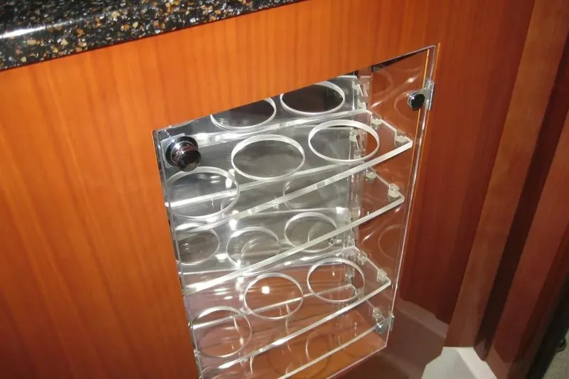 Slide: The Image of 2008 Doral Alegria yacht interior with wooden desk, stool, and lamp. - 72