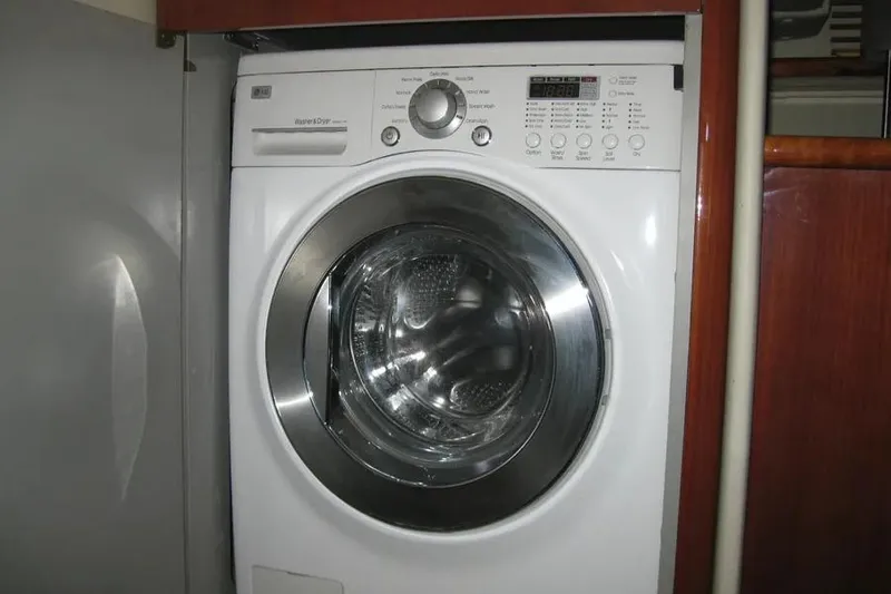 Slide: The Image of 2008 Doral Alegria bathroom interior with wooden cabinet and modern faucet. - 77