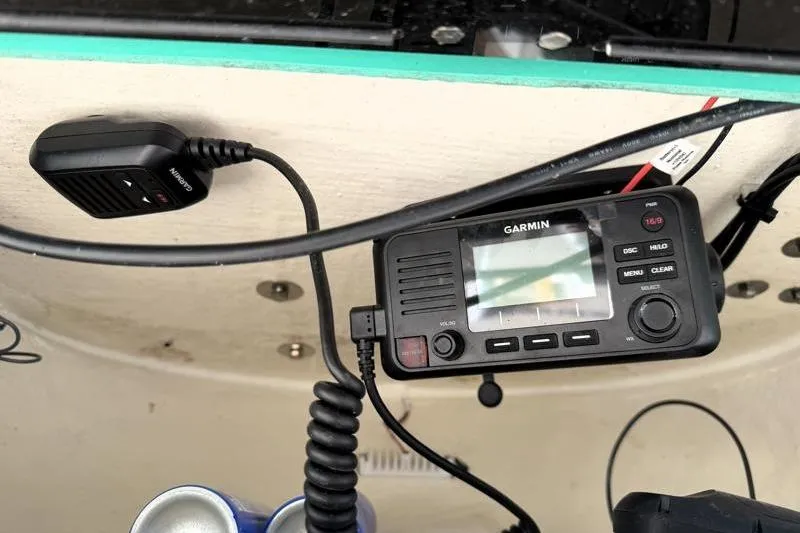 Slide: The Image of Garmin marine radio installed on 2025 Key West 239 FS boat dashboard. - 38
