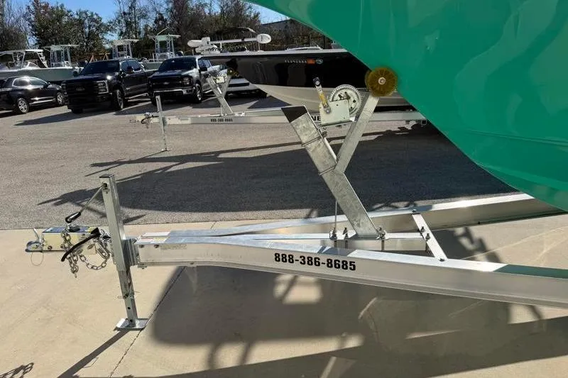 Slide: The Image of 2025 Key West 239 FS boat on trailer in parking lot. - 48