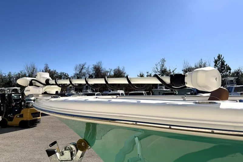 Slide: The Image of 2025 Key West 239 FS boat with mounted Garmin equipment under clear blue sky. - 9