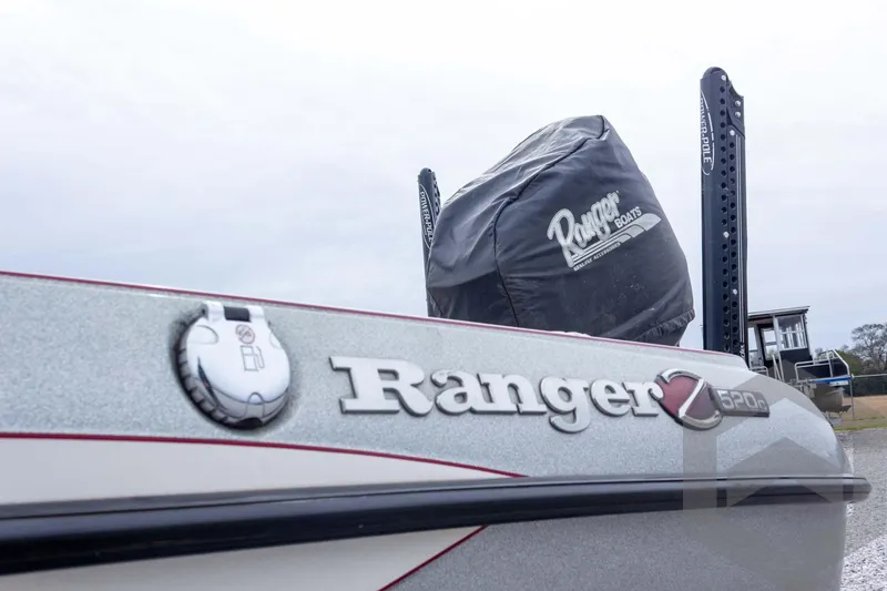 Slide: The Image of 2014 Ranger Z520 Comanche boat with branded cover and Power-Pole anchor. - 22