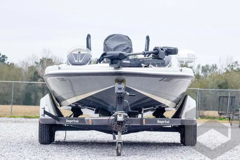 Slide: The Image of 2014 Ranger Z520 Comanche boat on trailer, parked outdoors. - 3
