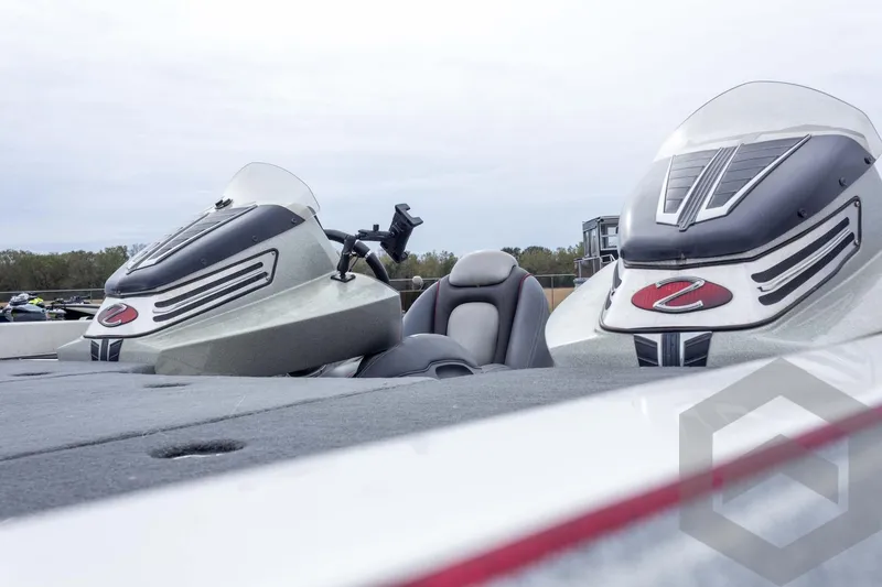 Slide: The Image of 2014 Ranger Z520 Comanche boat interior with dual consoles and seating. - 32