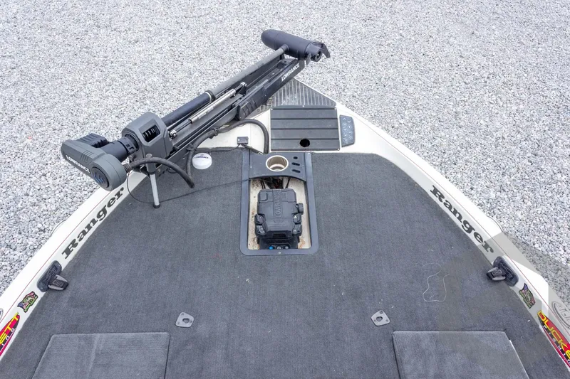 Slide: The Image of 2014 Ranger Z520 Comanche boat deck with Lowrance trolling motor and storage compartment. - 37